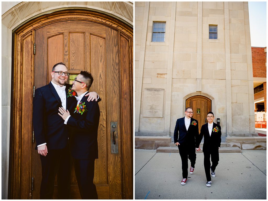 Couple standing together in front of a wooden door and walking across the street hand in hand looking at each other. Brian + Michaels Oz Themed Wedding