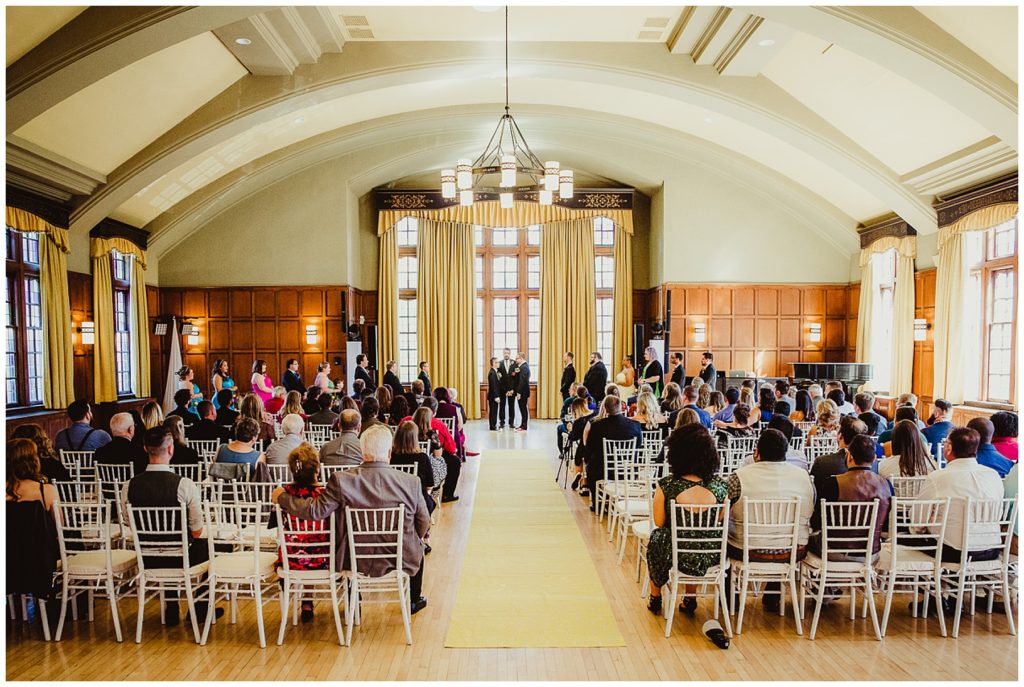 Full back of the room photo of n LGBTQ wedding held at the Michigan League