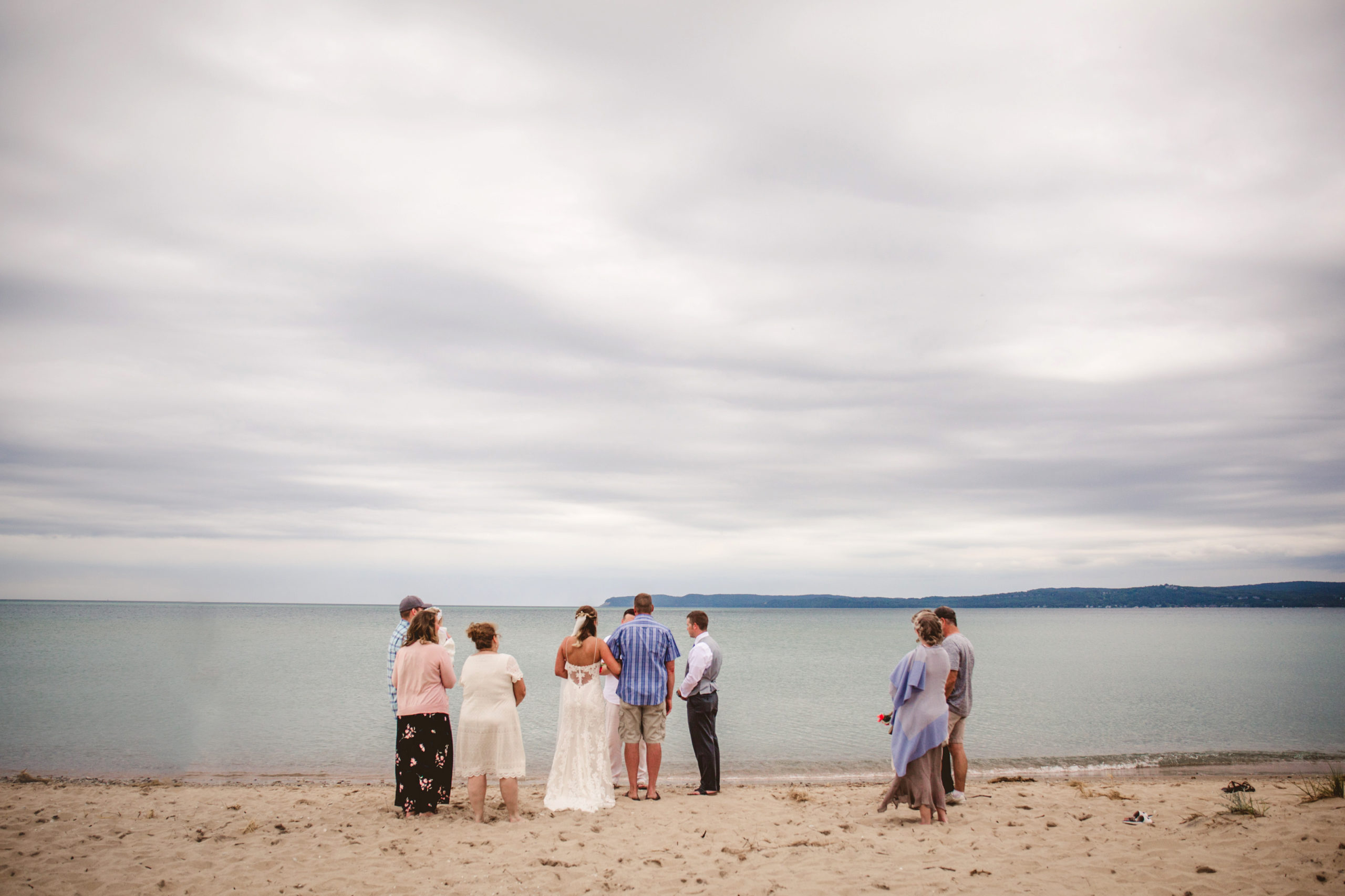 A small wedding takes place at the Maritime Museum in Sleeping Bear Sand Dunes. 8 reasons small weddings kick ass.