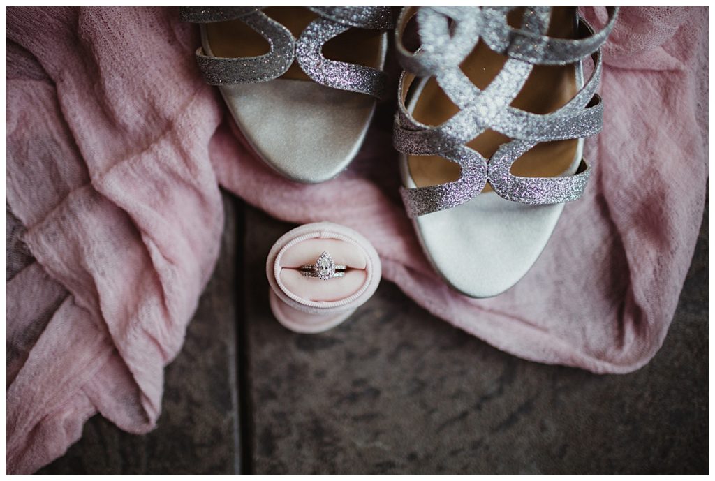 photo of ring and wedding shoes